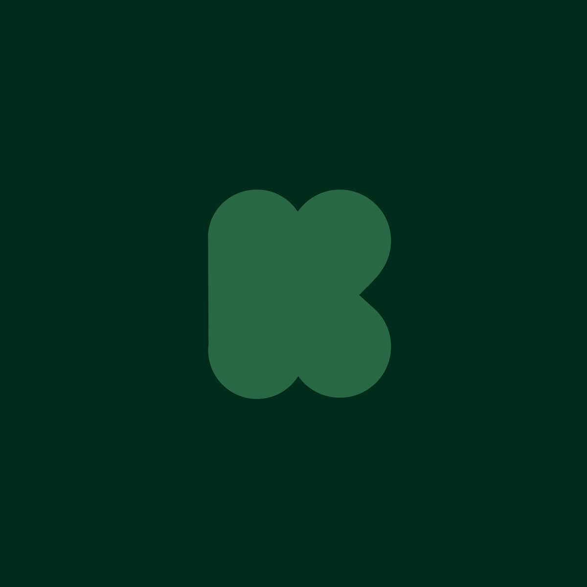 A minimalist logo featuring a stylized lowercase 'k' in a medium green color, centered on a solid dark green background.